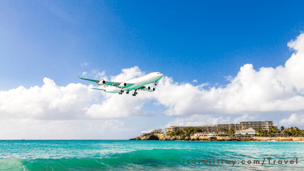 Dive into thrill at Maho Beach, St. Maarten! Watch planes land inches above your head in this jaw-dropping Caribbean paradise. Experience the adrenaline!
