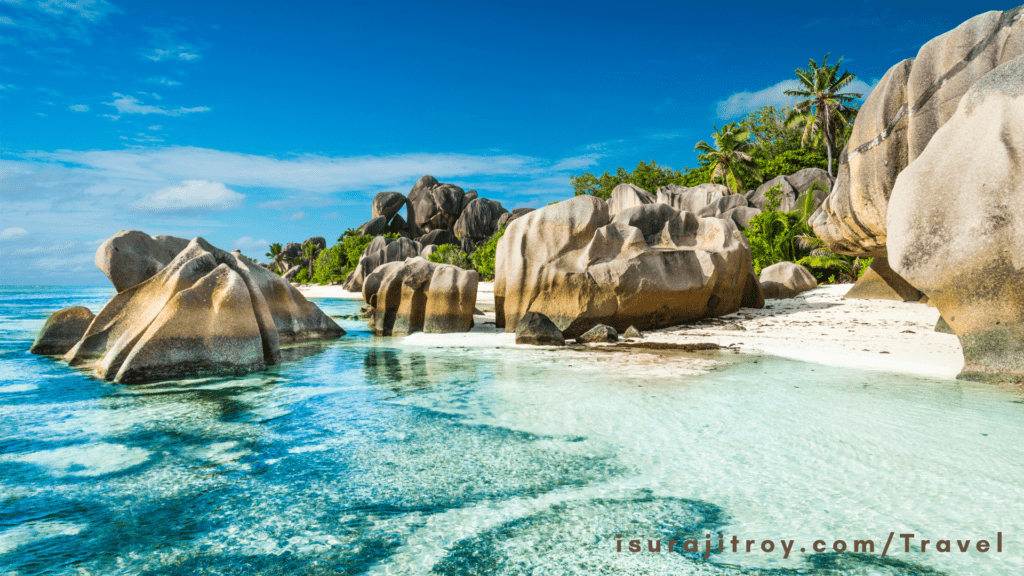 Unveil Paradise at Anse Source d'Argent! Dive into crystal-clear waters, stroll along blush-colored sands - the epitome of Seychelles' breathtaking beauty awaits!
