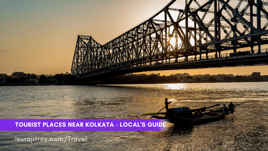 Iconic Howrah Bridge at dusk, spanning the Hooghly River in Kolkata, India. A marvel of engineering and a symbol of the city's vibrant heritage.